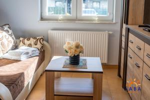 Fotografia z galérie ubytovania LABA Kołobrzeg Apartamenty BURSZTYNOWE z miejscami postojowymi v destinácii Kołobrzeg