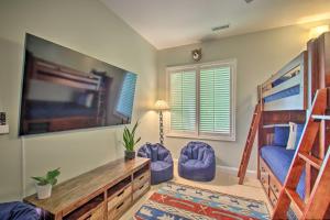 a bedroom with bunk beds and a desk and a bed at Grand Chalet with Hot Tub - Near Wintergreen Resort in Wintergreen