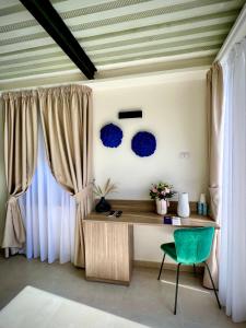Postel nebo postele na pokoji v ubytování Boutique Hotel Palazzo Donna Iulia