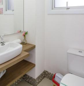 Koupelna v ubytování Lindo residencial no centro de Gramado