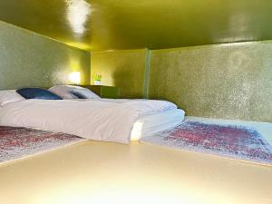 Postel nebo postele na pokoji v ubytování Studio Apartment in attraktiver und zentraler Lage