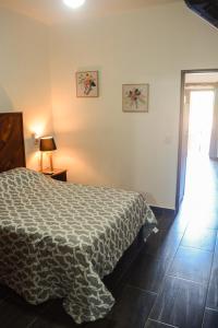 Postel nebo postele na pokoji v ubytování DownTown Rooms San Pancho Mexico