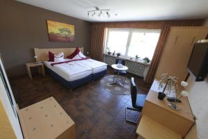Ένα ή περισσότερα κρεβάτια σε δωμάτιο στο Gasthof Brinkmeier