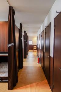 Postel nebo postele na pokoji v ubytování SAMURAI STAY 洗足池-male only 男性専用