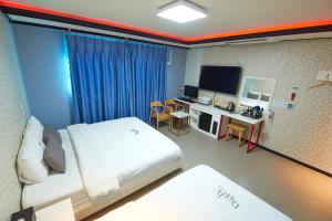 TV a/nebo společenská místnost v ubytování Hotel Danube Seomyeon