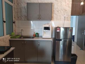 Køkken eller tekøkken på Bangi Gateway Service Apartment