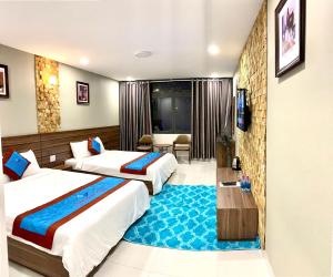 Postelja oz. postelje v sobi nastanitve DALAT STREAM HOTEL-Khách sạn đẹp Đà Lạt
