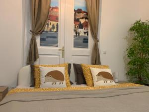 Posteľ alebo postele v izbe v ubytovaní Forst-Ház Apartman