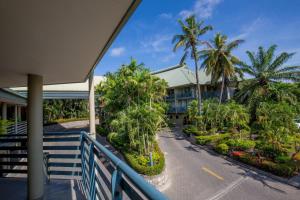 a view of a resort with palm trees at Gateway Hotel in Port Moresby