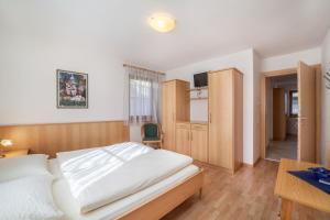 Ένα ή περισσότερα κρεβάτια σε δωμάτιο στο Parigger Apt Zirbe