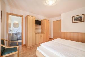 Ένα ή περισσότερα κρεβάτια σε δωμάτιο στο Parigger Apt Zirbe