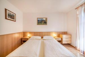 Ένα ή περισσότερα κρεβάτια σε δωμάτιο στο Parigger Apt Zirbe