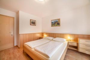 Ένα ή περισσότερα κρεβάτια σε δωμάτιο στο Parigger Apt Zirbe