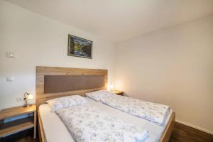 En eller flere senger på et rom på Parigger Apt Enzian