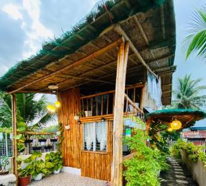 Zahrada ubytování Joyful Hut with Netflix and Perfect Sunrise View Maya, Daanbantayan