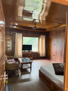 TV a/nebo společenská místnost v ubytování Ramneek Homestay