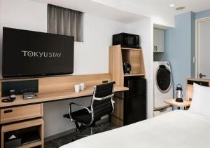TV a/nebo společenská místnost v ubytování Tokyu Stay Shibuya Shin-Minamiguchi