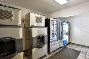 a kitchen with a refrigerator and a freezer at Motel 6-South Lake Tahoe, CA in South Lake Tahoe