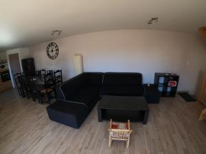 Posezení v ubytování Maison neuve proche de Barcelonnette