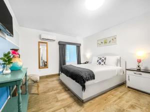 Postel nebo postele na pokoji v ubytování Casa Pellegrino Boutique Hotel