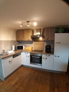 Kuchyň nebo kuchyňský kout v ubytování APPARTEMENT Michael