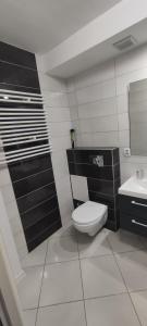 Ένα μπάνιο στο Apartament CENTRUM