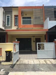 a house with a white gate and a garage at Koolest homestays Meru in Ipoh