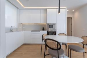 Kuchnia lub aneks kuchenny w obiekcie Uma Suites O'Donnell