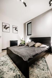 Posteľ alebo postele v izbe v ubytovaní Krane Apartments Ó utca