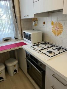 A kitchen or kitchenette at Senza Pensieri via Viviani