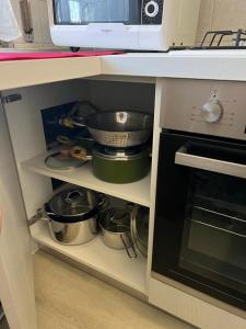 A kitchen or kitchenette at Senza Pensieri via Viviani