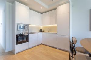 Kuchnia lub aneks kuchenny w obiekcie Uma Suites O'Donnell