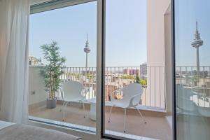 Balkon lub taras w obiekcie Uma Suites O'Donnell