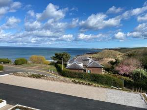 an estate with a view of the ocean at 1 The Bay - Stunning contemporary flat on the Scottish coast in Coldingham