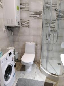 Ένα μπάνιο στο Apartament Leśny