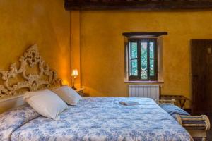 Postel nebo postele na pokoji v ubytování Casa rural Can Jepet