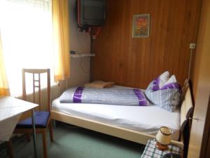 Posteľ alebo postele v izbe v ubytovaní Haus zur Linde