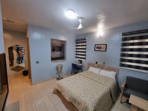 Katil atau katil-katil dalam bilik di Amazing Grace Hostel and International Serviced Apartments