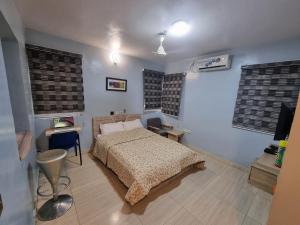 Katil atau katil-katil dalam bilik di Amazing Grace Hostel and International Serviced Apartments