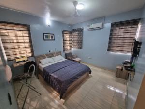 Katil atau katil-katil dalam bilik di Amazing Grace Hostel and International Serviced Apartments