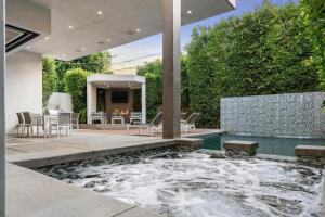 a swimming pool in the backyard of a house at Orlando Estate in Los Angeles