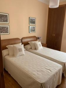 Postel nebo postele na pokoji v ubytování RAMBLA CENTRO - Apartamento excepcional en el corazón de Almería