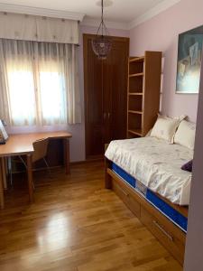 Postel nebo postele na pokoji v ubytování RAMBLA CENTRO - Apartamento excepcional en el corazón de Almería
