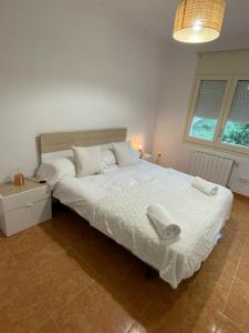 Posteľ alebo postele v izbe v ubytovaní Casa Veuràs Girona - Montilivi