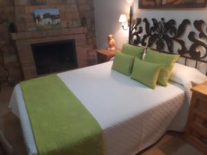 Кровать или кровати в номере Casa Cueva Soledad