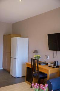 Kuchyň nebo kuchyňský kout v ubytování Hotel Bella Luna