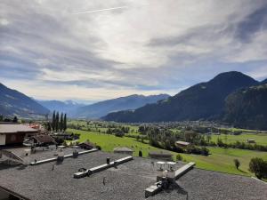 a view of a valley with mountains in the background at Apart MountainView in Bruck am Ziller