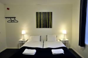 Postel nebo postele na pokoji v ubytování Hedenstugan B&B Hotel