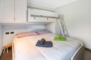 Posteľ alebo postele v izbe v ubytovaní Appartamento Silvia