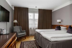 Кровать или кровати в номере Best Western Gustaf Wasa Hotel +37 фотографий